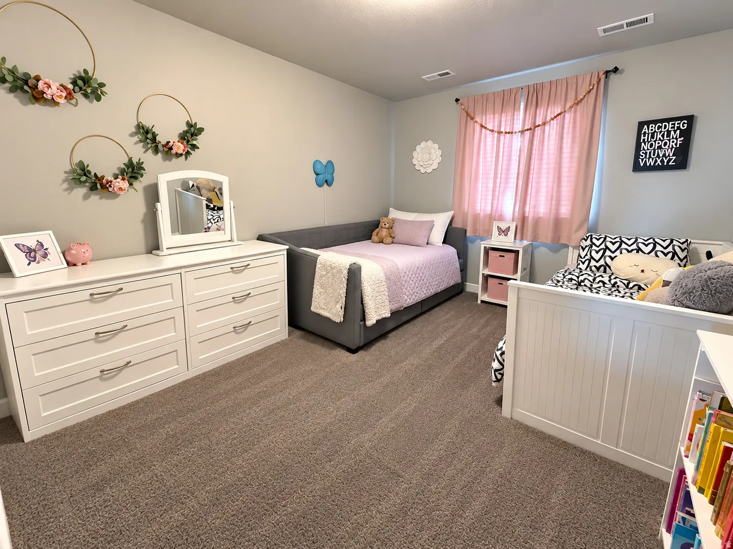 Wall-to-wall carpeting and neutral wall paint