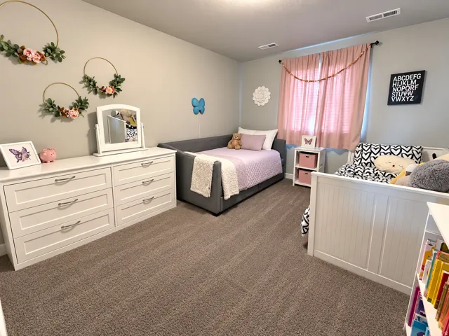 Wall-to-wall carpeting and neutral wall paint