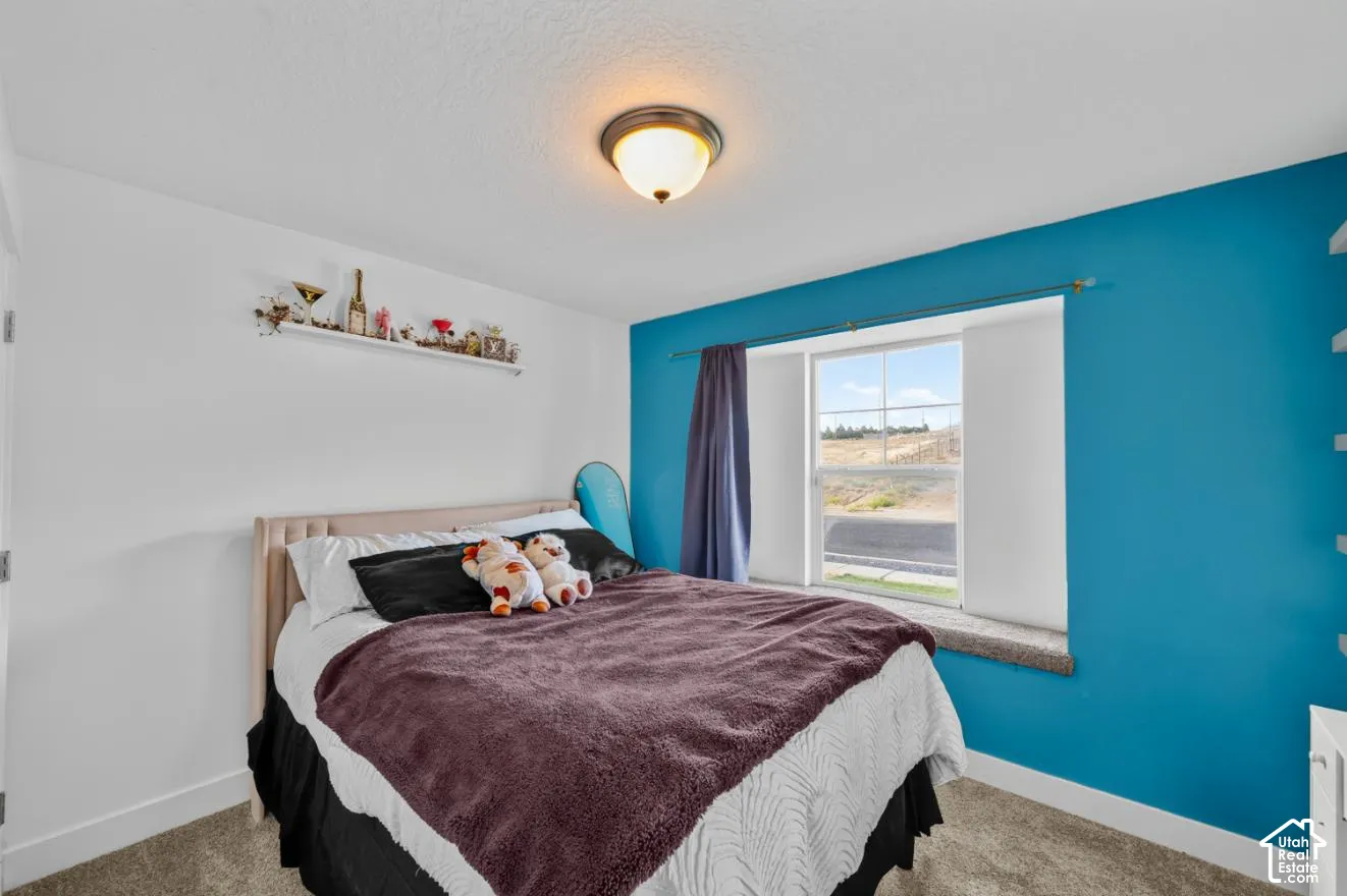 Recessed window with a built-in sill and wall-mounted shelving