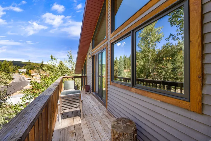 Expansive wood deck with a perimeter railing
