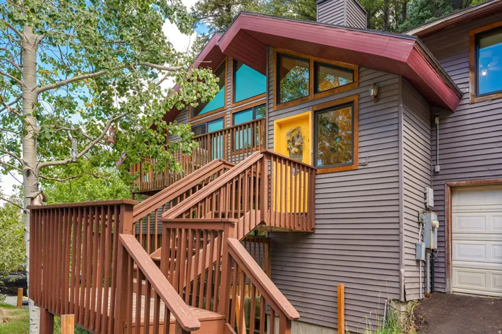 Multi-level wood deck with natural wood railings