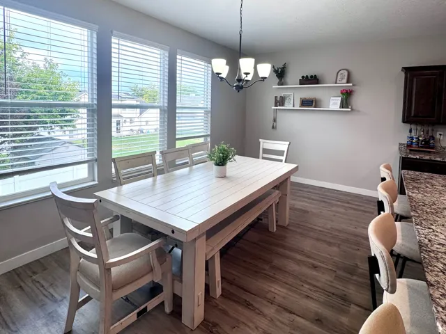 Wood-finish flooring throughout the dining area