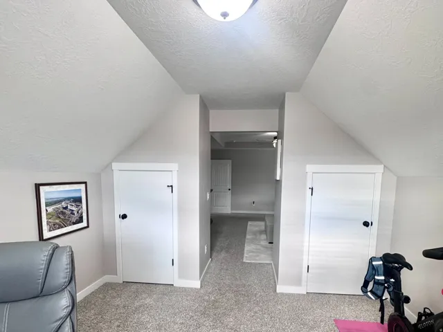 Vaulted ceiling with a flush-mount light fixture