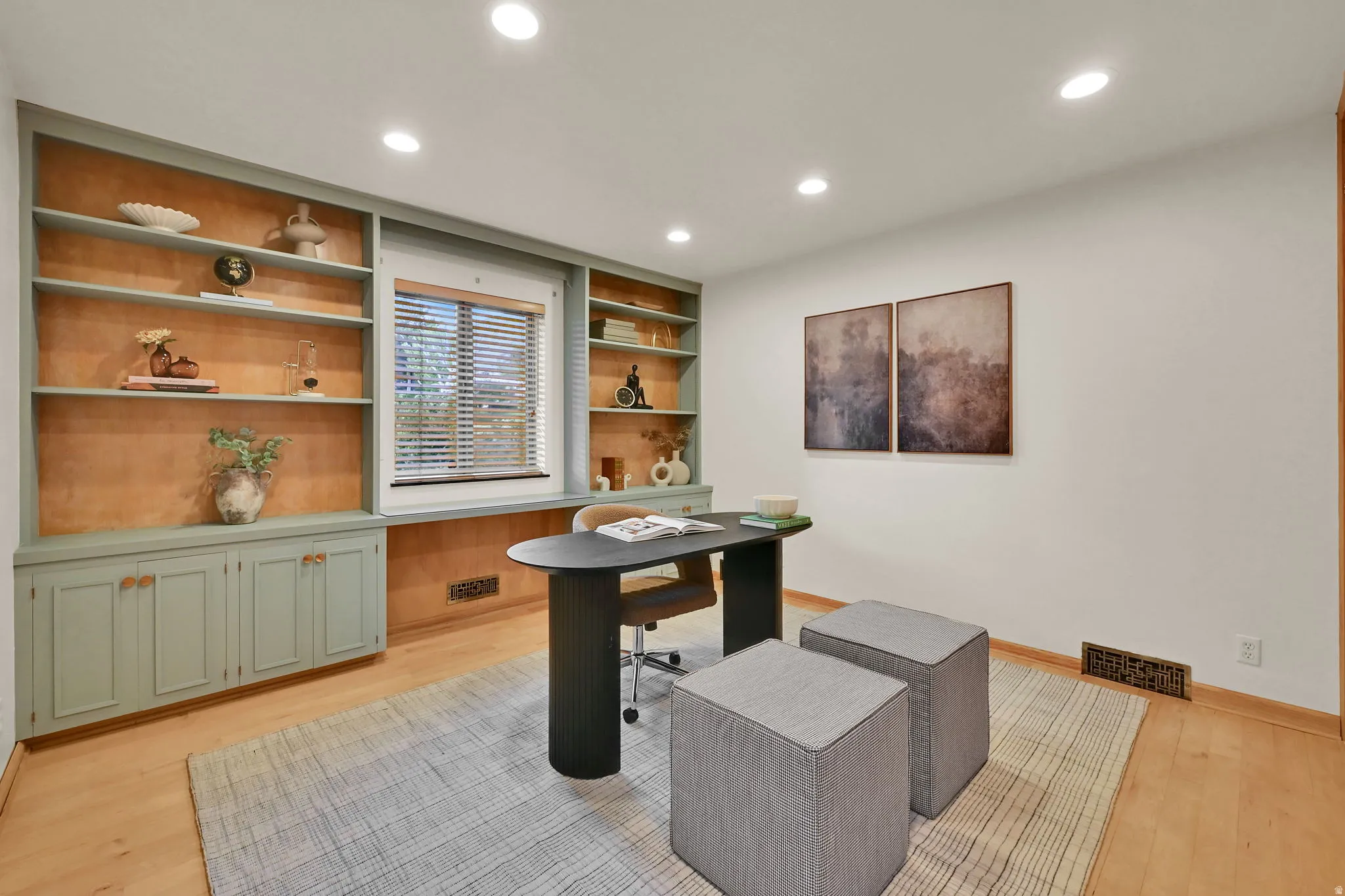 Built-in shelving with cabinetry, wood-finish flooring, recessed lighting, and a window with blinds