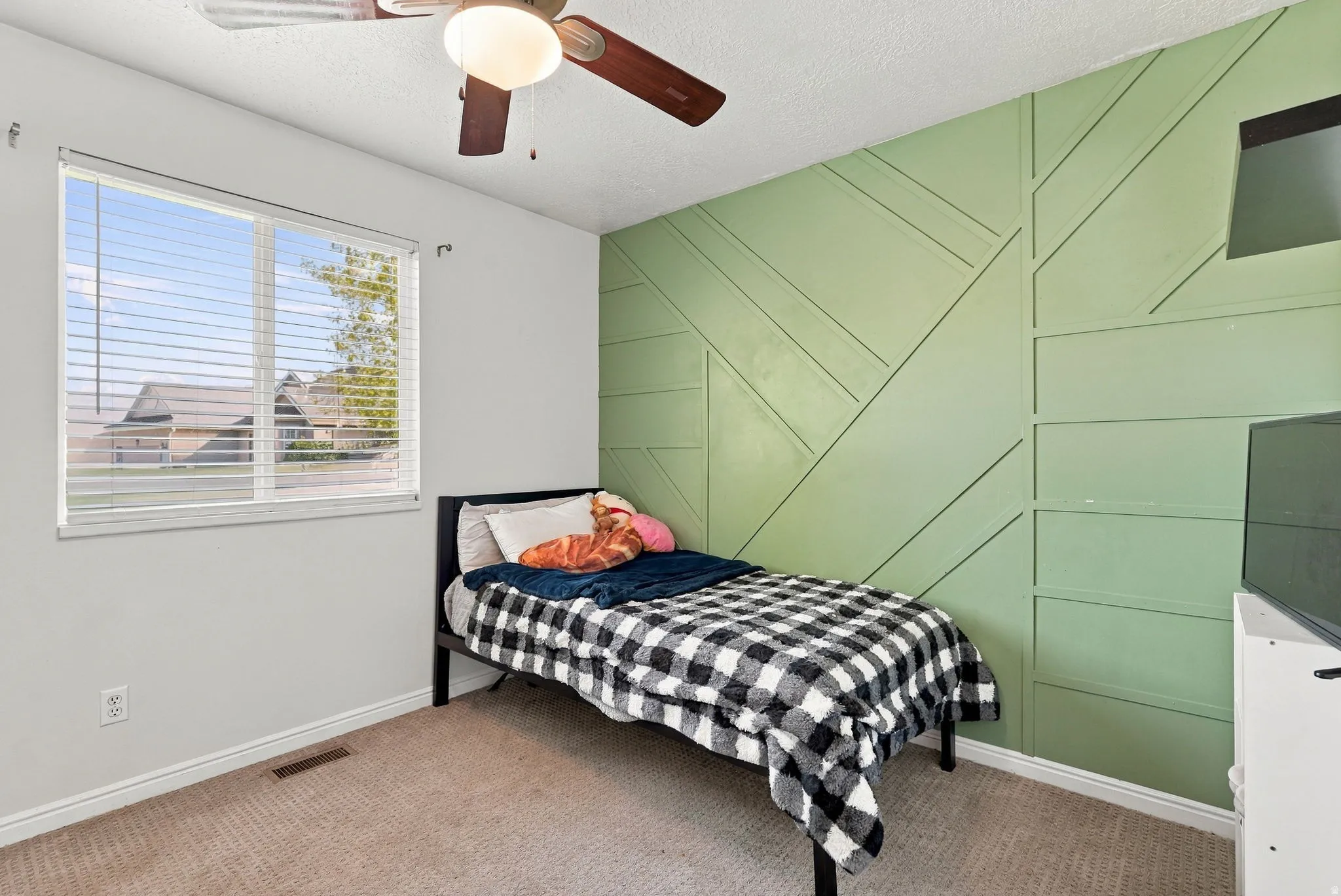 Accent wall with geometric paneling