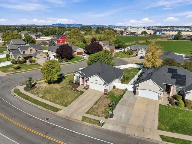 Residential neighborhood setting with concrete driveways
