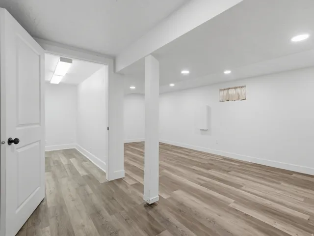 Large Family Room/Theater/Gaming Room - whatever your needs are - this space is large and can accommodate it. A second room down - exercise room/craft room/etc. Large storage room also on this level.