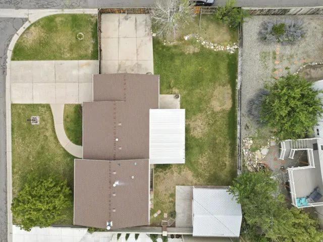 Notice the RV Pad/Play Area/Parking Area off to the side of the home. Access from the other side street.