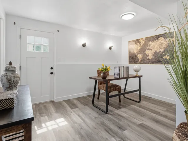 Office or Bedroom #5. Note the exterior entry door - perfect for a home office/salon/etc.