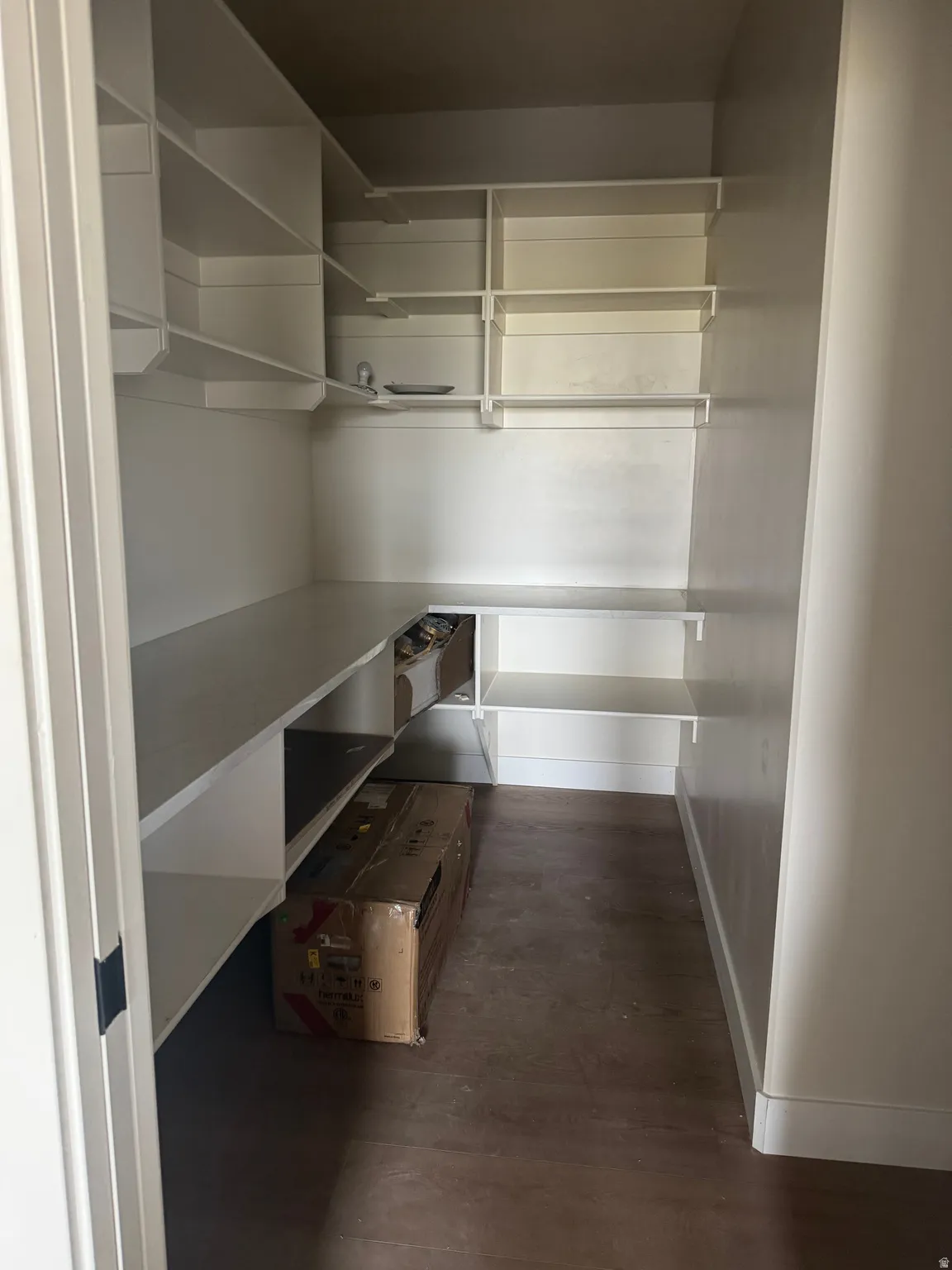 Built-in shelving with white finishes