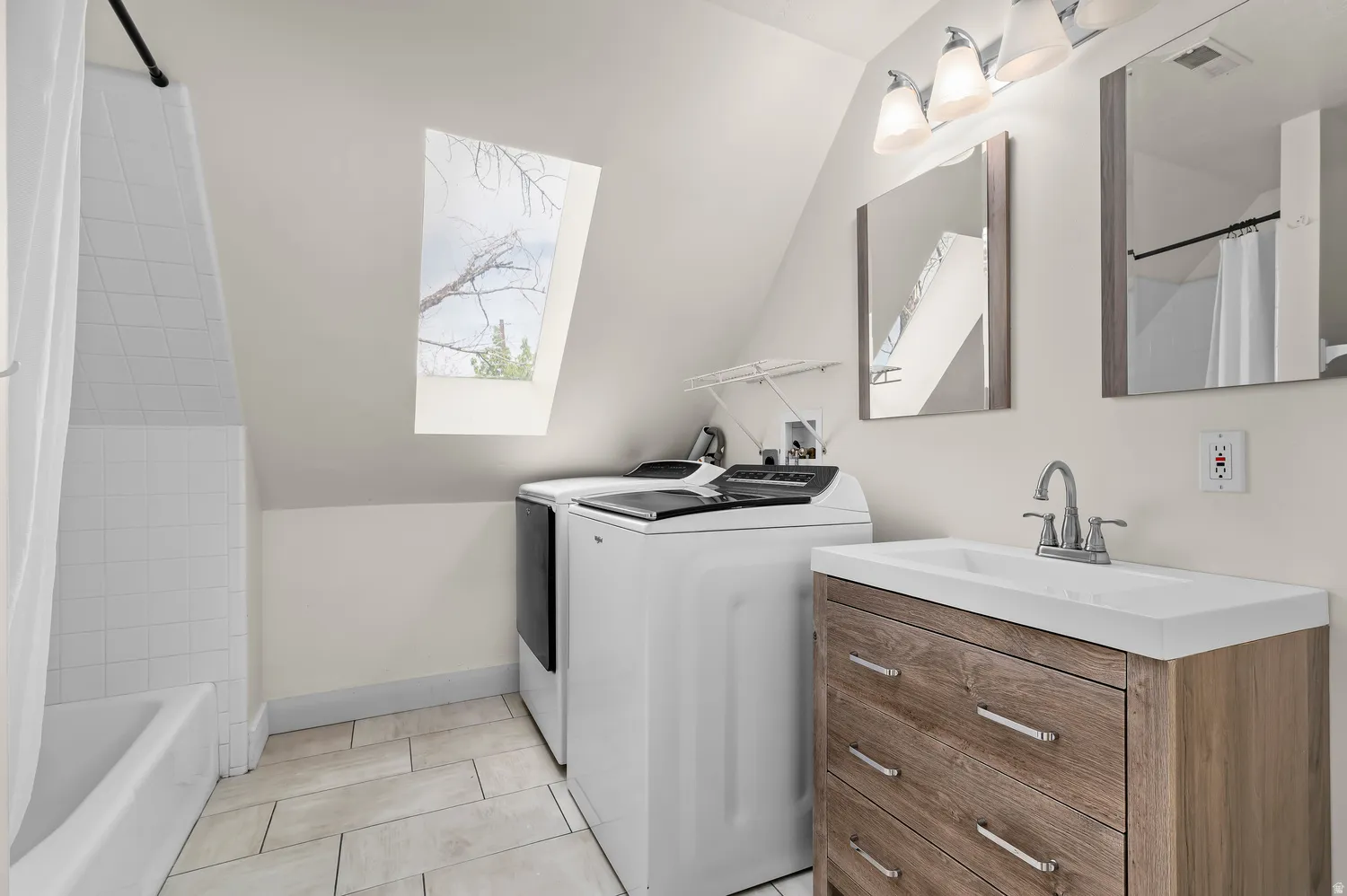 2nd floor hall bathroom with laundry