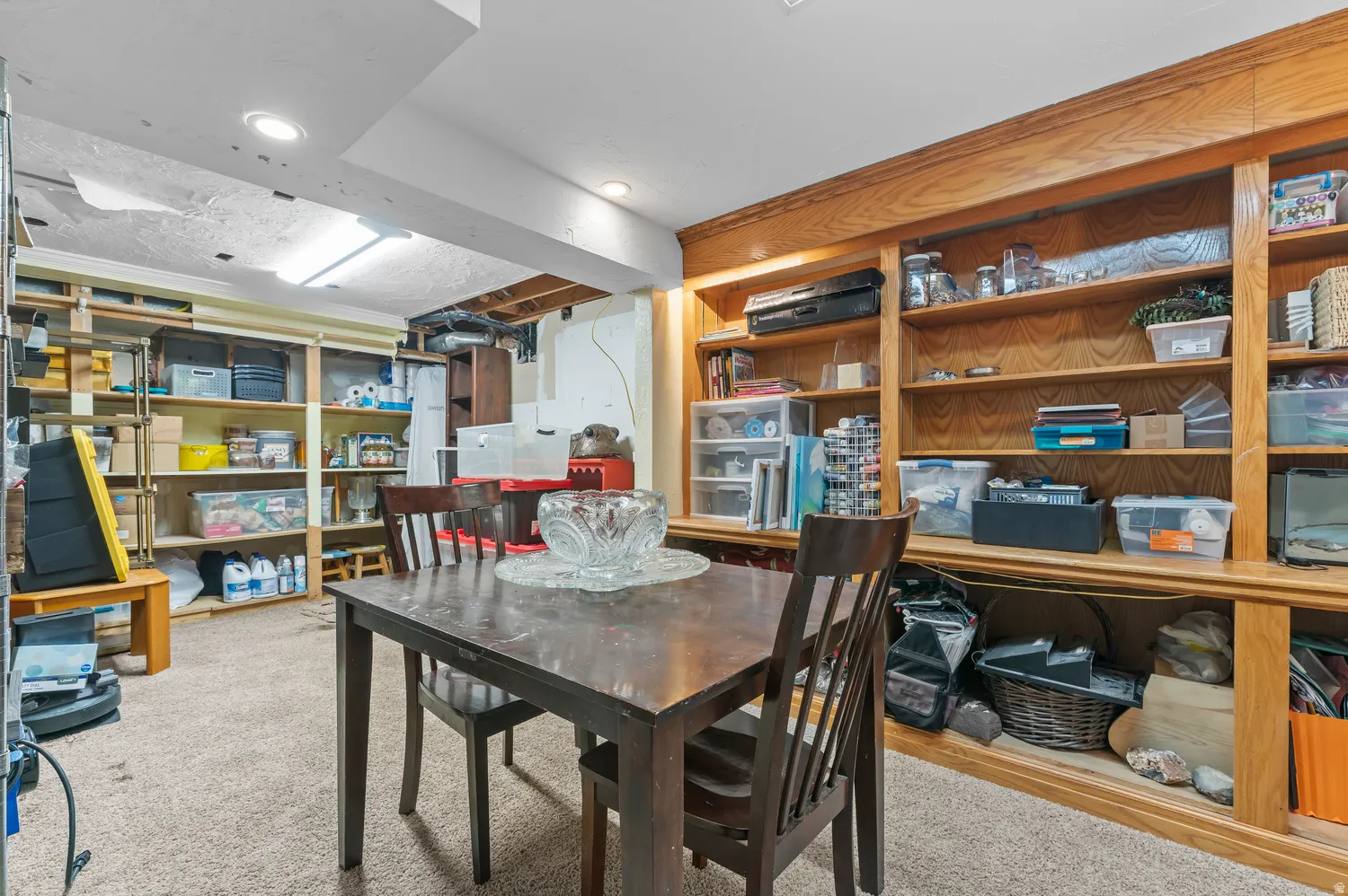 Built-in wood shelving and recessed lighting