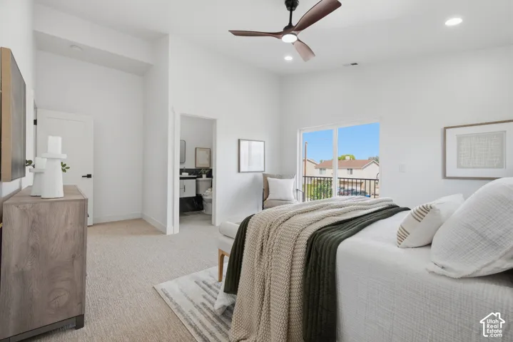 Vaulted ceiling with a ceiling fan, recessed lighting, sliding glass door with balcony access, and plush carpeting