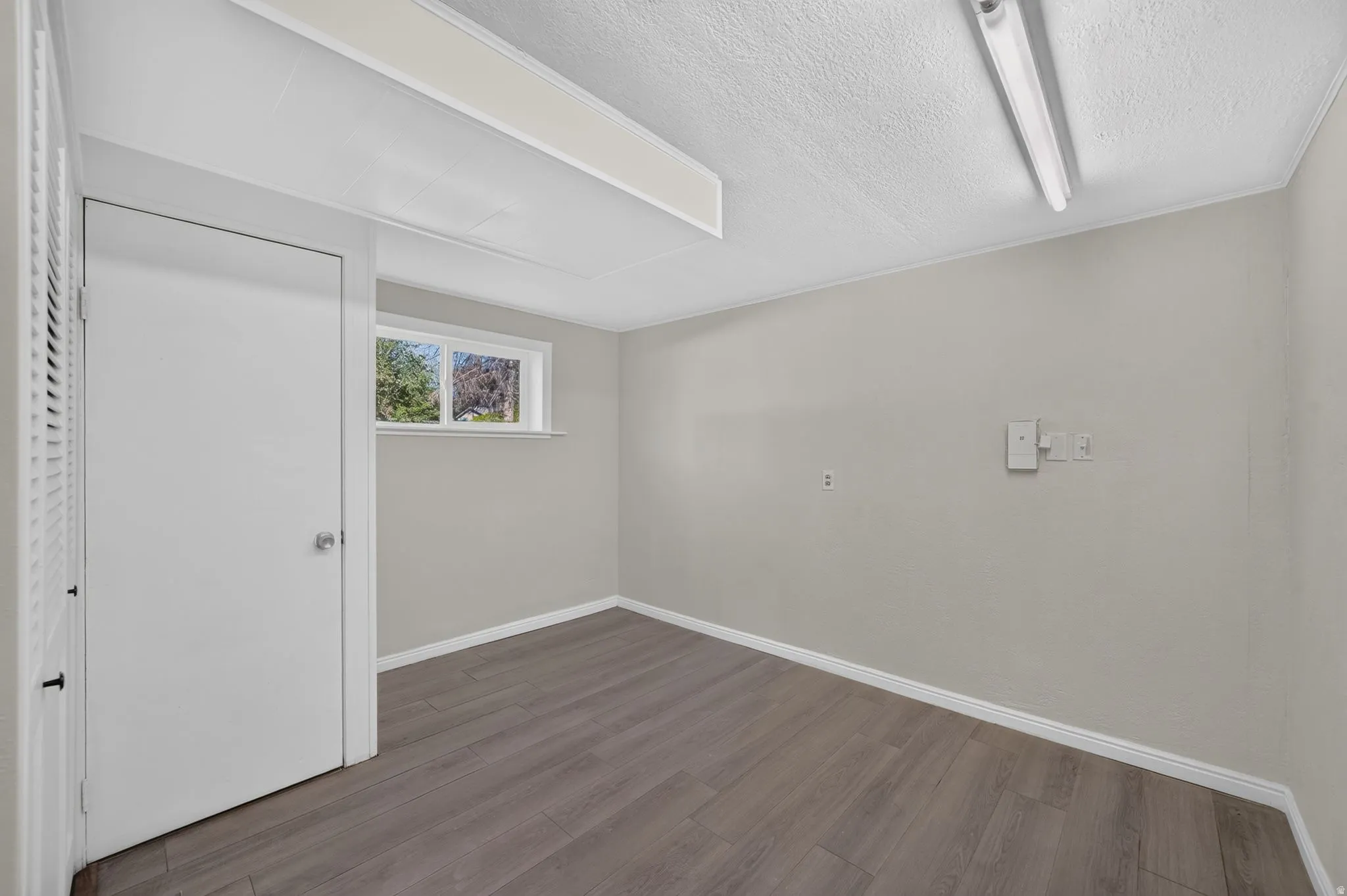 Wood-finish flooring with white trim