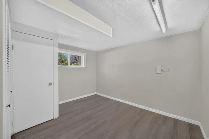 Wood-finish flooring with white trim