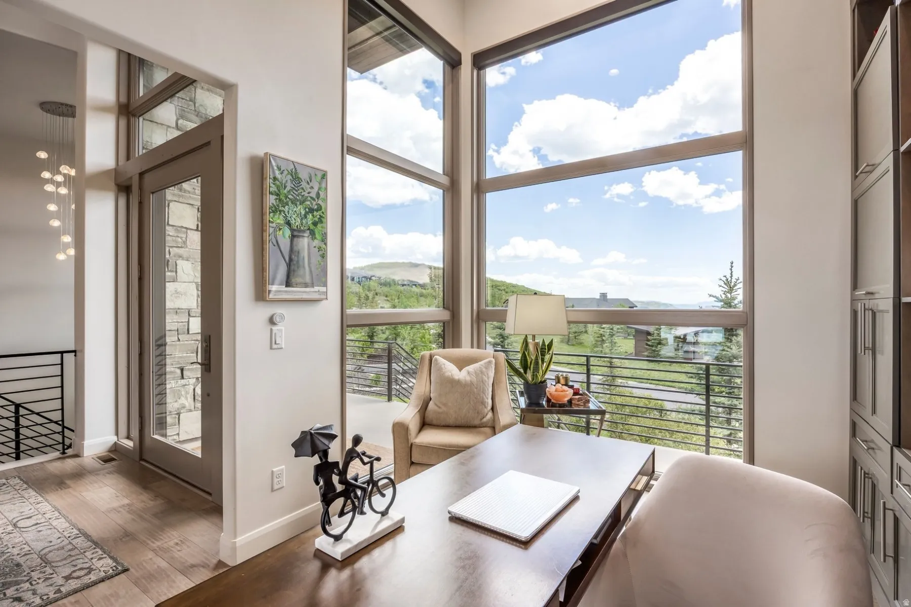 Floor-to-ceiling windows with expansive mountain scenery