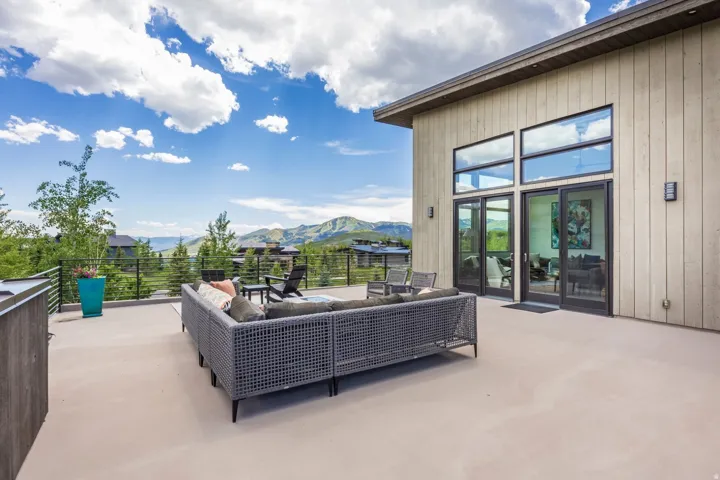 Expansive outdoor terrace featuring durable concrete flooring