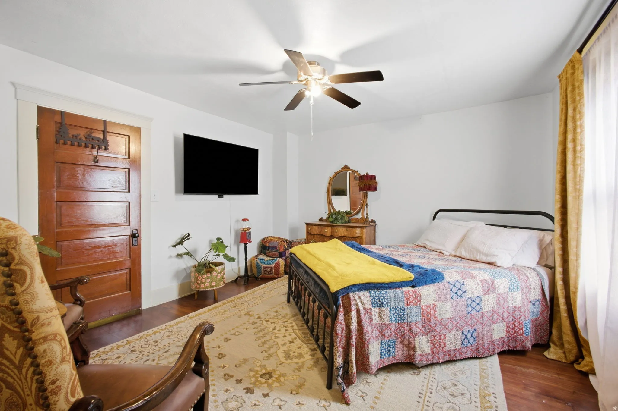 Hardwood flooring with original door.