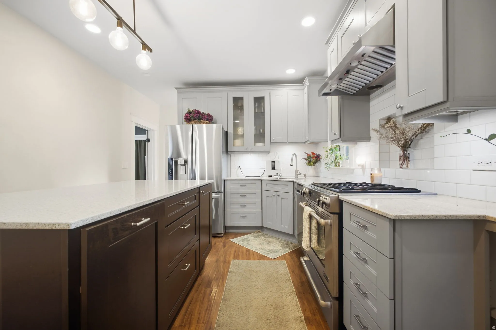 Kitchen features beautiful two-tone cabinetry.