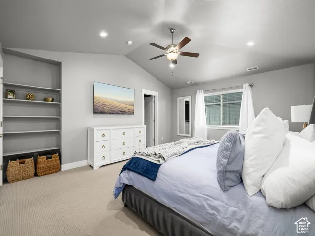 Vaulted ceiling featuring a ceiling fan with integrated lighting and recessed lighting