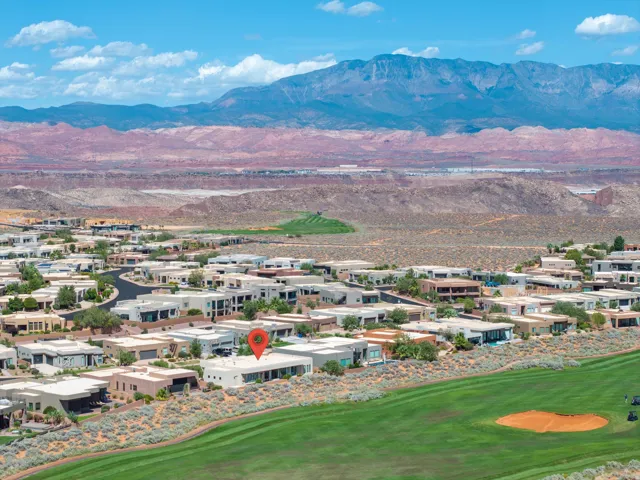 Golf course frontage with mountain backdrop