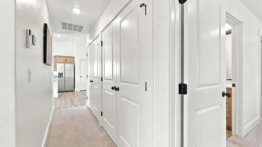 White panel doors with matte black hardware