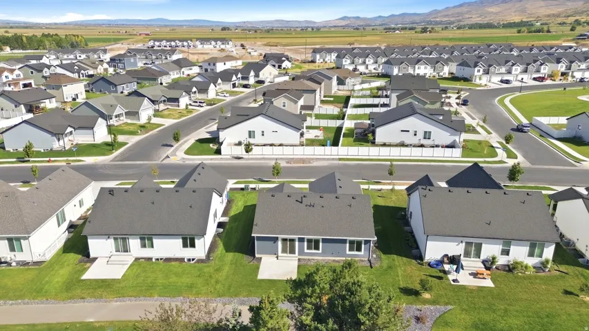 Paved streets with sidewalks and mature landscaping