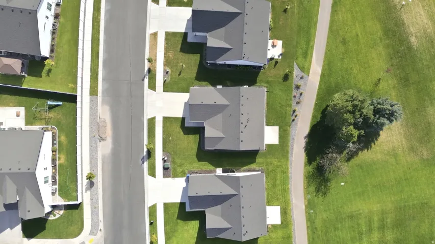 Modern residential street with uniform house designs