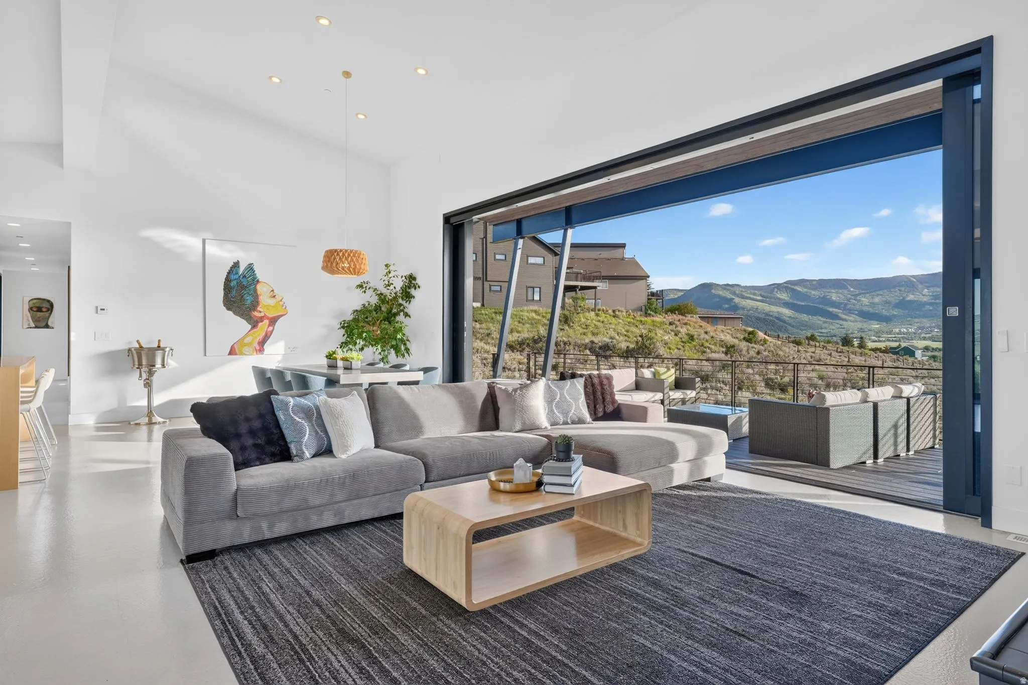 Vaulted ceilings, recessed lighting, and a spacious open-concept living area