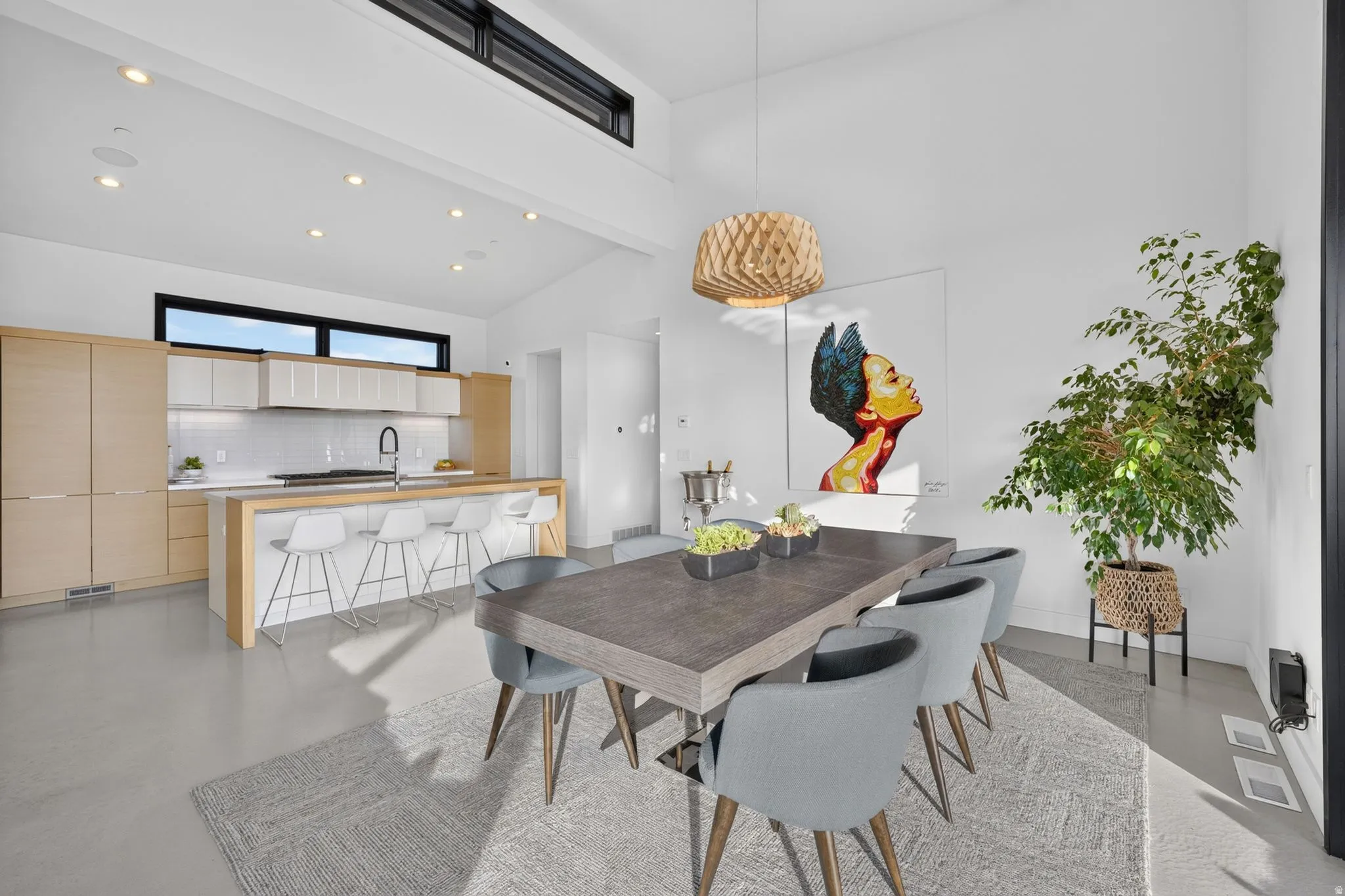 Vaulted ceiling with skylight and recessed lighting