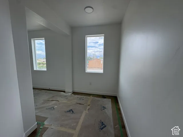 Recessed lighting and two windows provide natural illumination