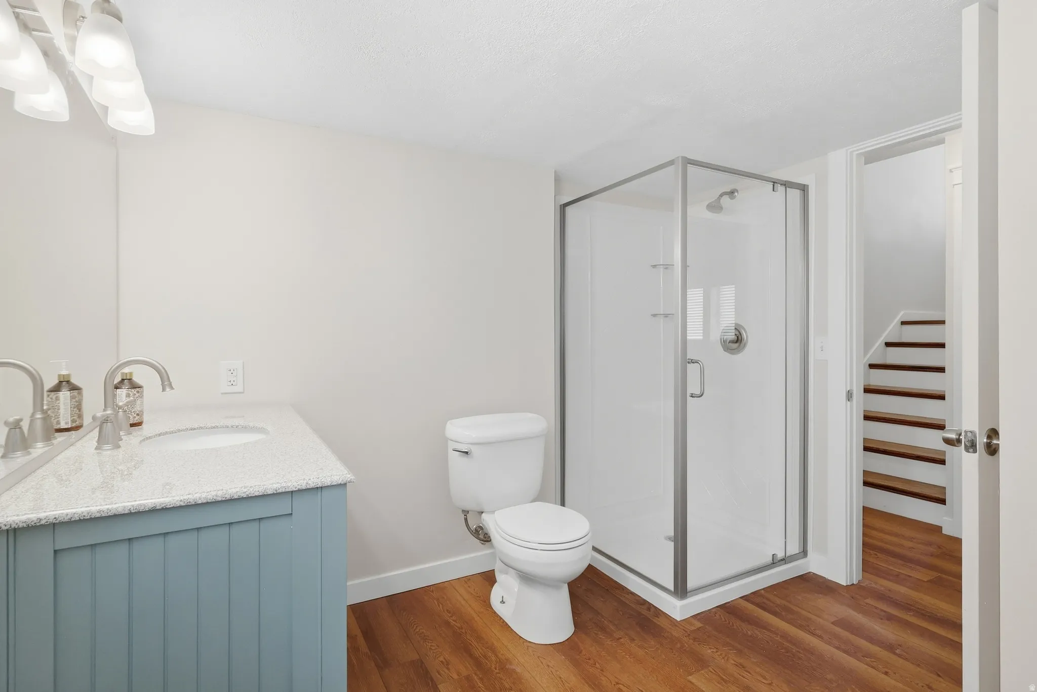 Wood-finish flooring throughout