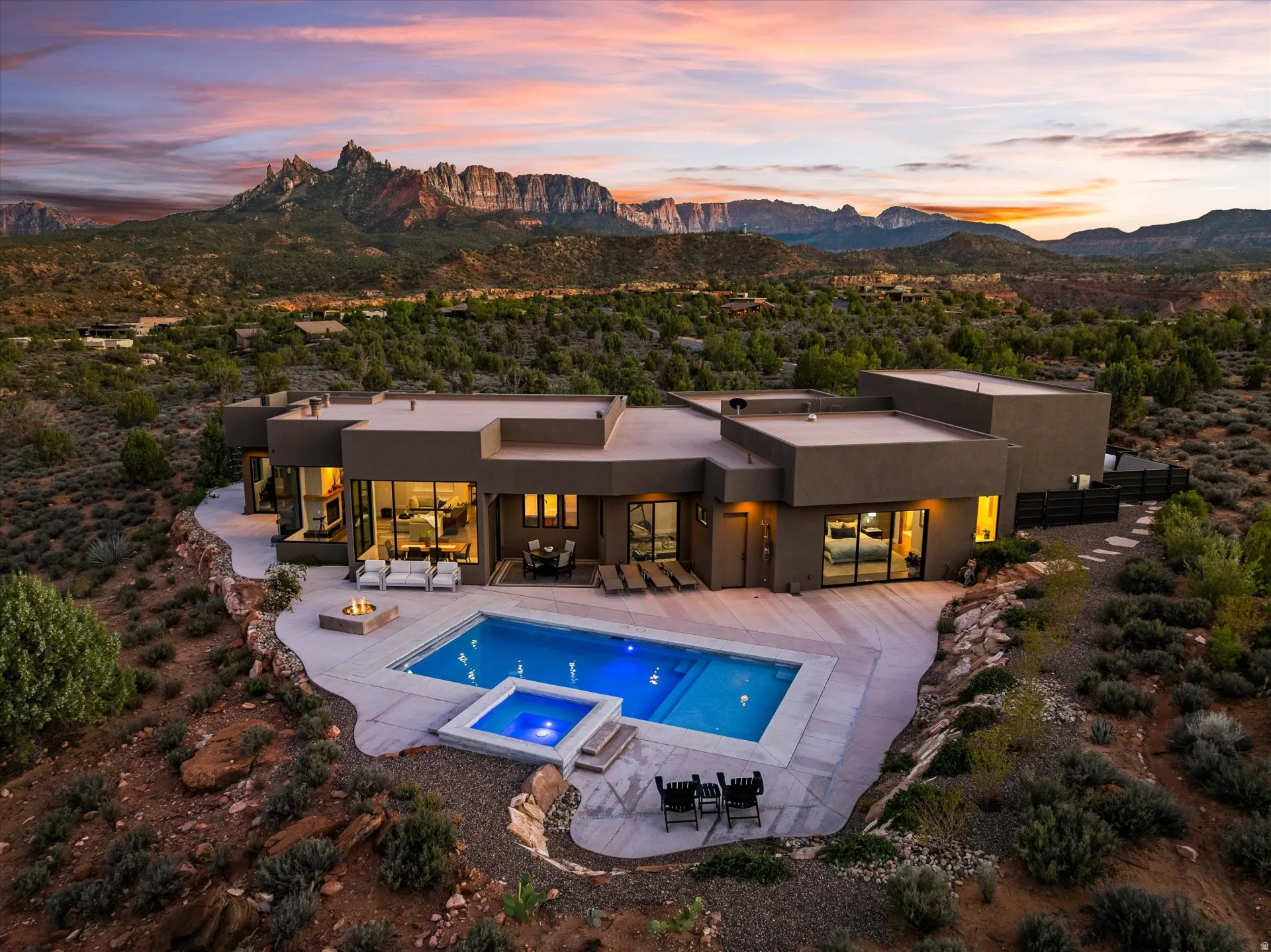 Designed with the view in mind: the cliffs of Zion National Park rise right outside nearly every window of this 2024-built home on the Anasazi Plateau.