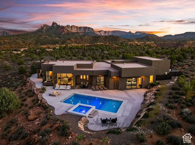 Designed with the view in mind: the cliffs of Zion National Park rise right outside nearly every window of this 2024-built home on the Anasazi Plateau.