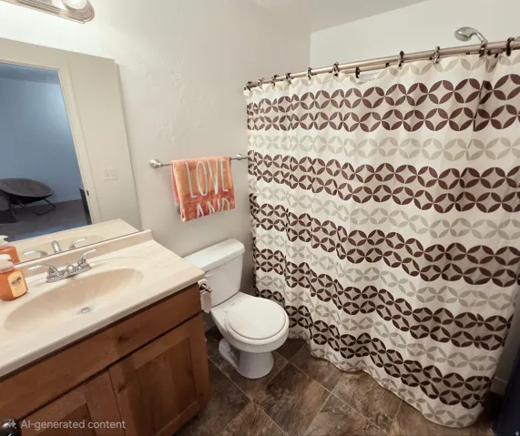 Wood-finish flooring with a vanity featuring a built-in sink and two-door cabinetry