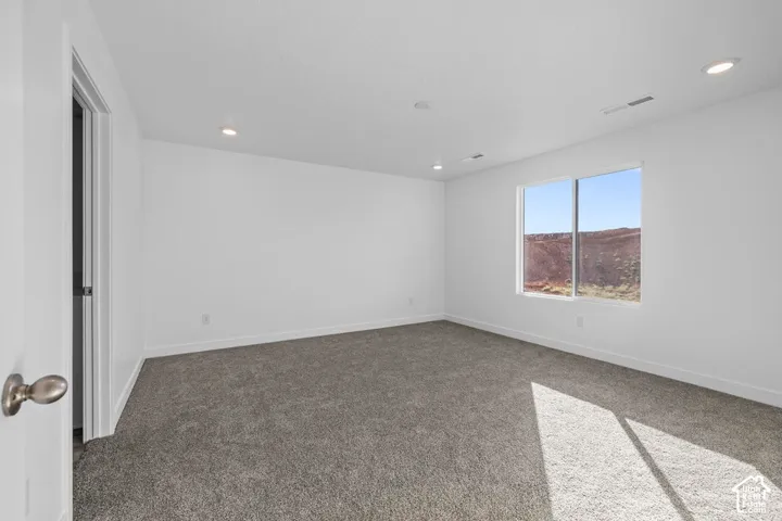 White walls with gray carpeting
