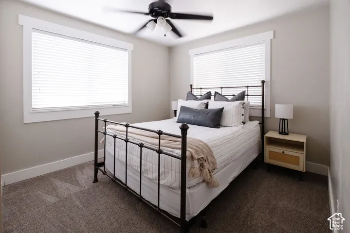 Neutral-toned walls complement the textured carpeting