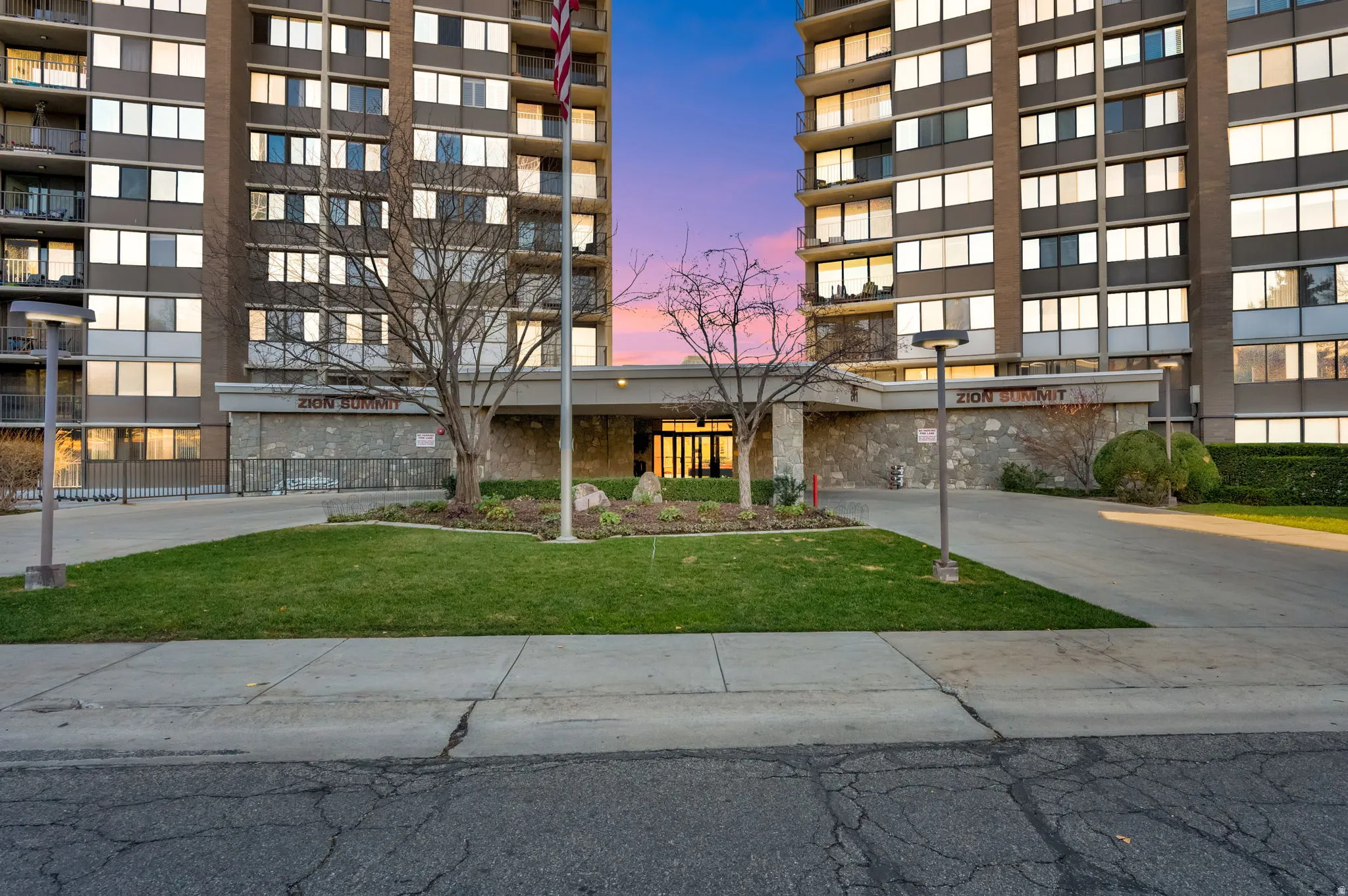 Dual high-rise residential buildings with multiple balconies