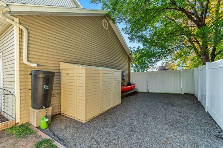 Private backyard, fully fenced with side yard RV parking area