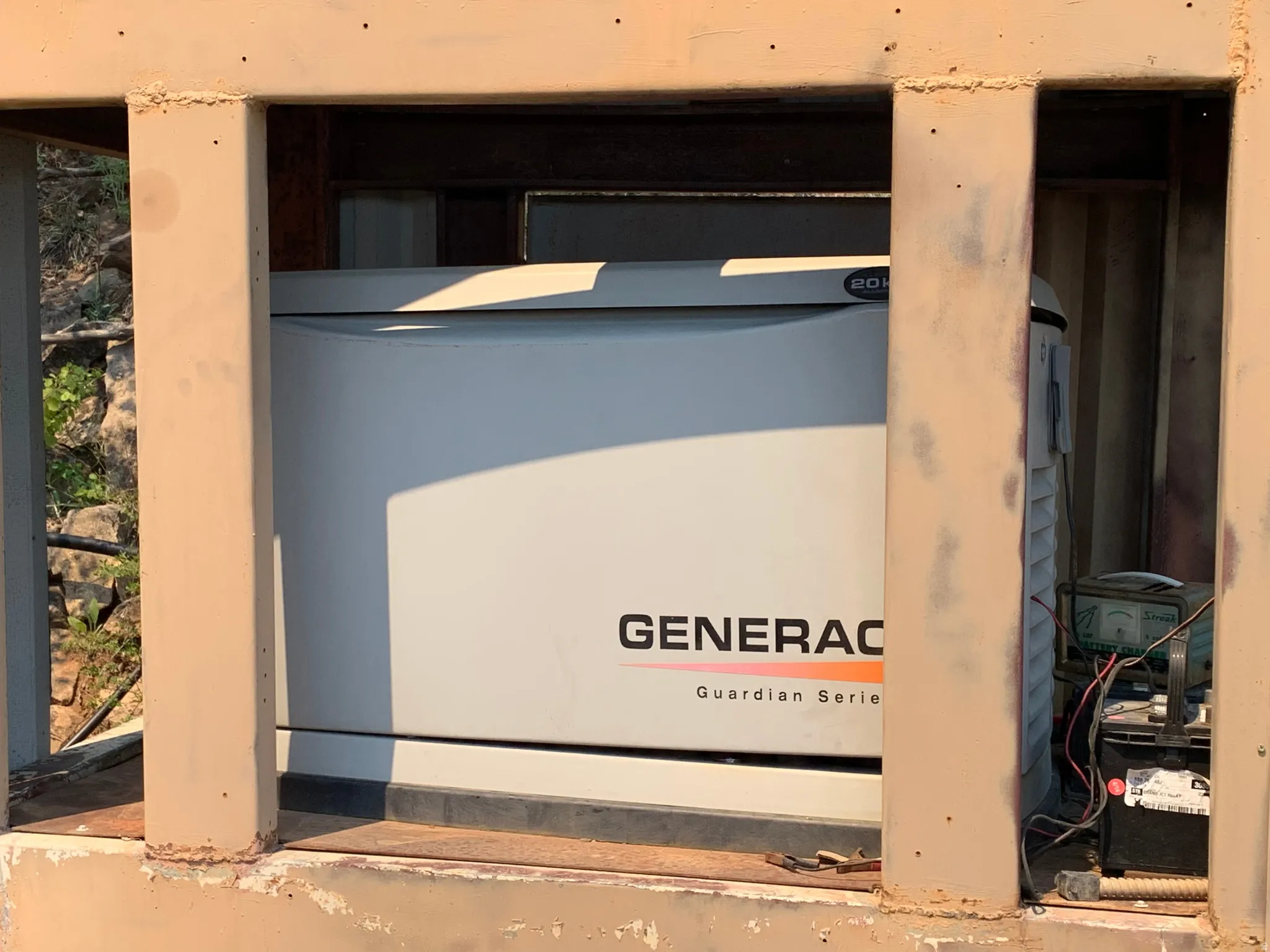 Generac Guardian Series generator within an outdoor enclosure