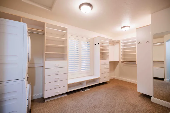 Custom built-in closet system with shelving and drawers