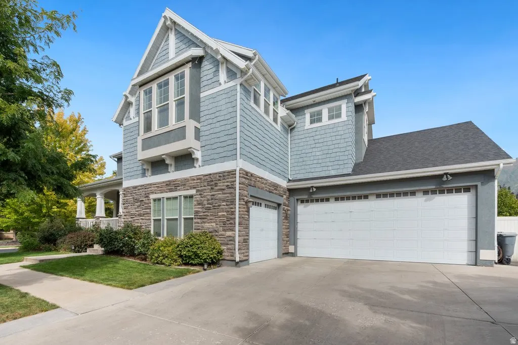 Stone veneer and shingle siding exterior