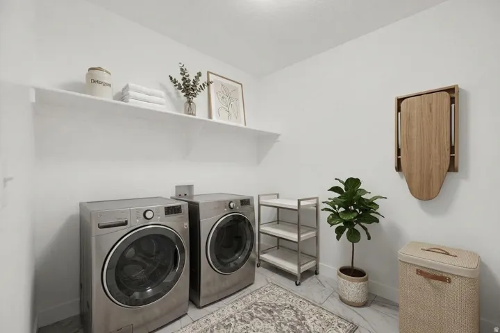 Wall-mounted shelving, built-in appliances, and a wall-mounted ironing board
