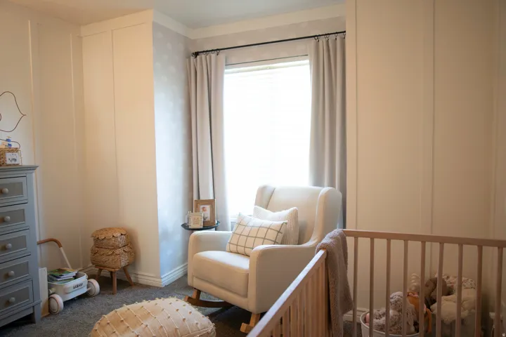 Neutral wall finishes, crown molding, and soft carpeting