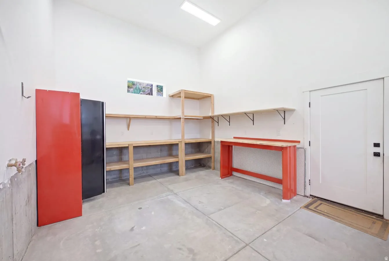 4 car tandum garage with a costco door to unload groceries stright into your pantry. Featuring extra high ceilings, extra length and, extra width