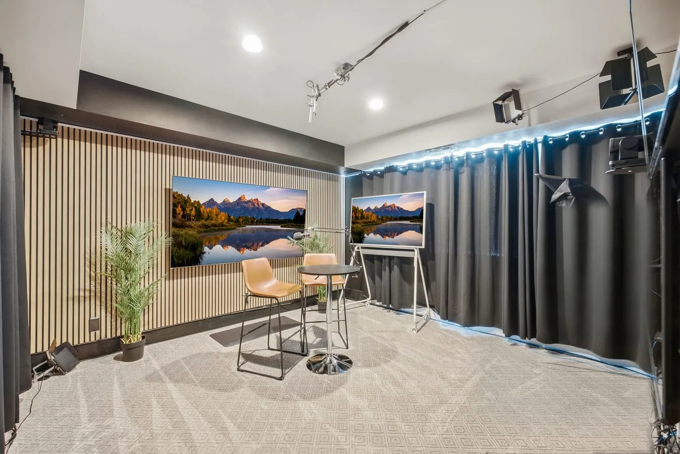Dedicated Podcast/AV room with ability to have 4 large screen TV's on the right wall. Currently there are 3 large screen TV's