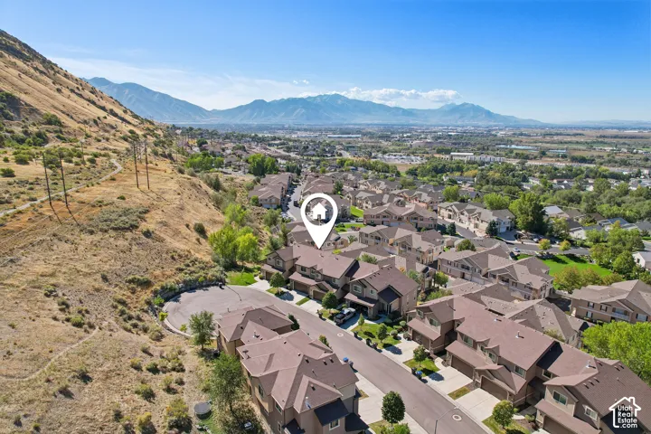 Residential neighborhood with mountainous terrain and community housing