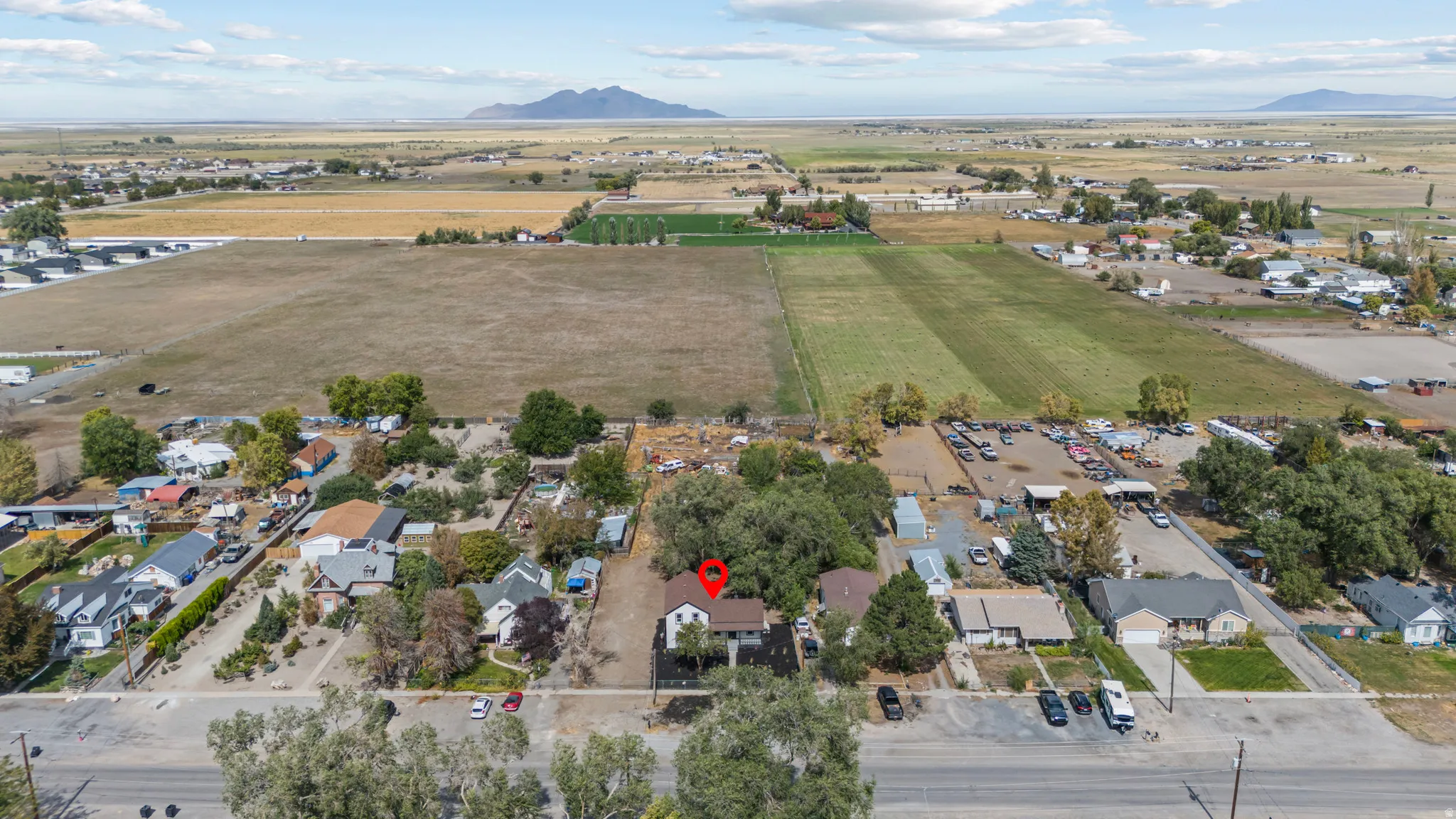 Expansive rural landscape with distant mountains