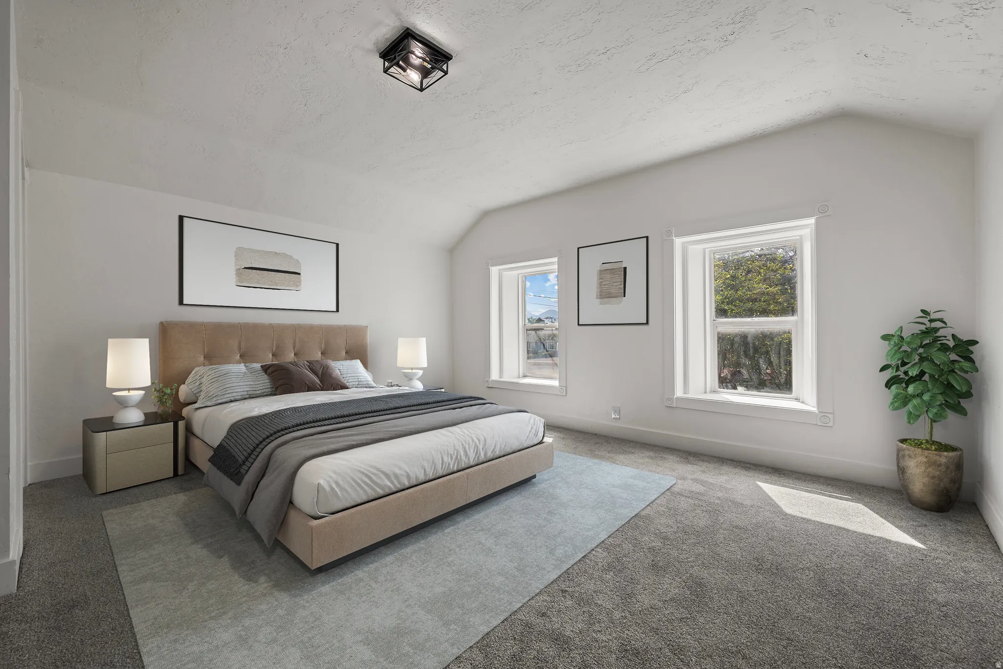 Vaulted ceiling, two windows, recessed lighting, and grey carpeting