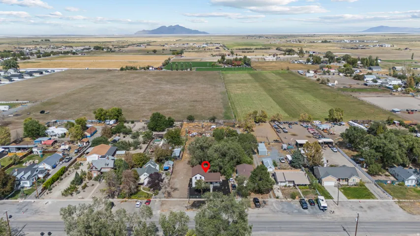 Expansive rural landscape with distant mountains